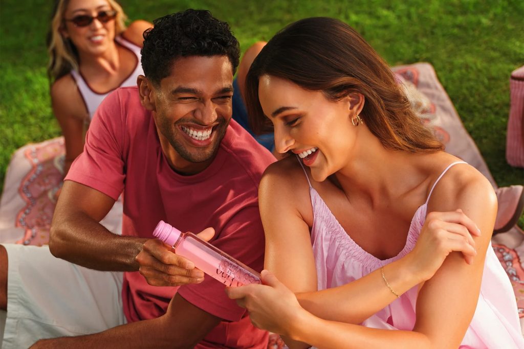 A couple sharing a bottle of PocoVino.